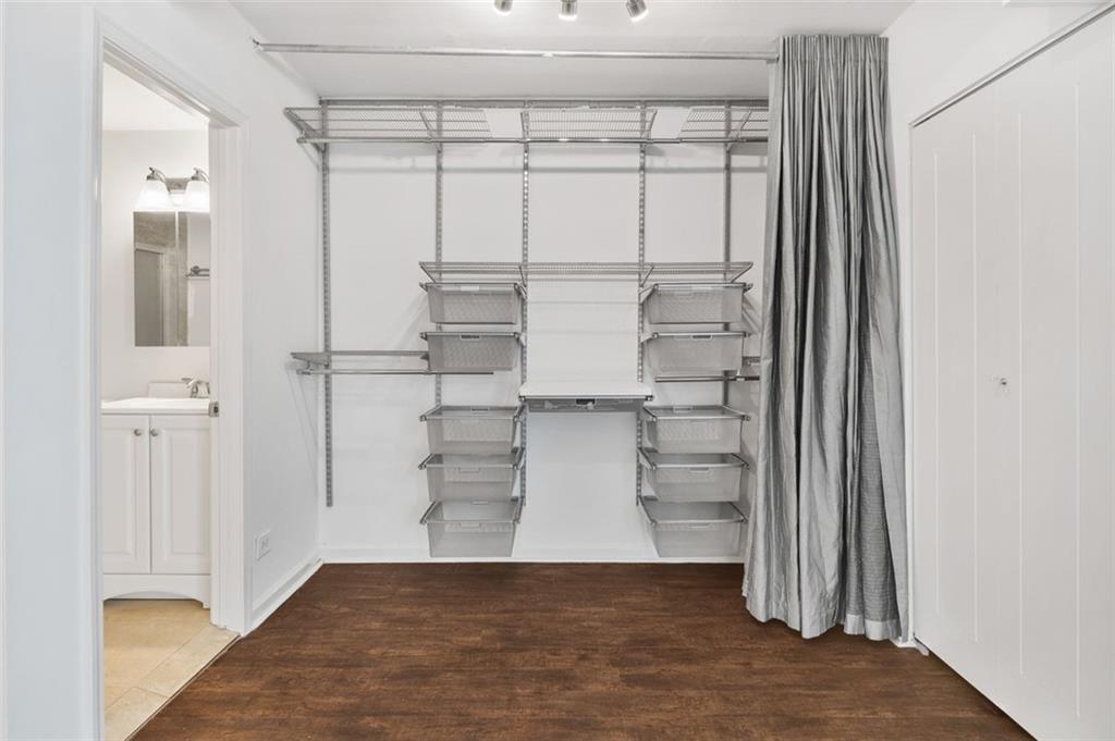 620 Peachtree Street Northeast, Unit 1716 Atlanta, GA 30308 - Photo 16 of 37 a view of a walk in closet with empty racks