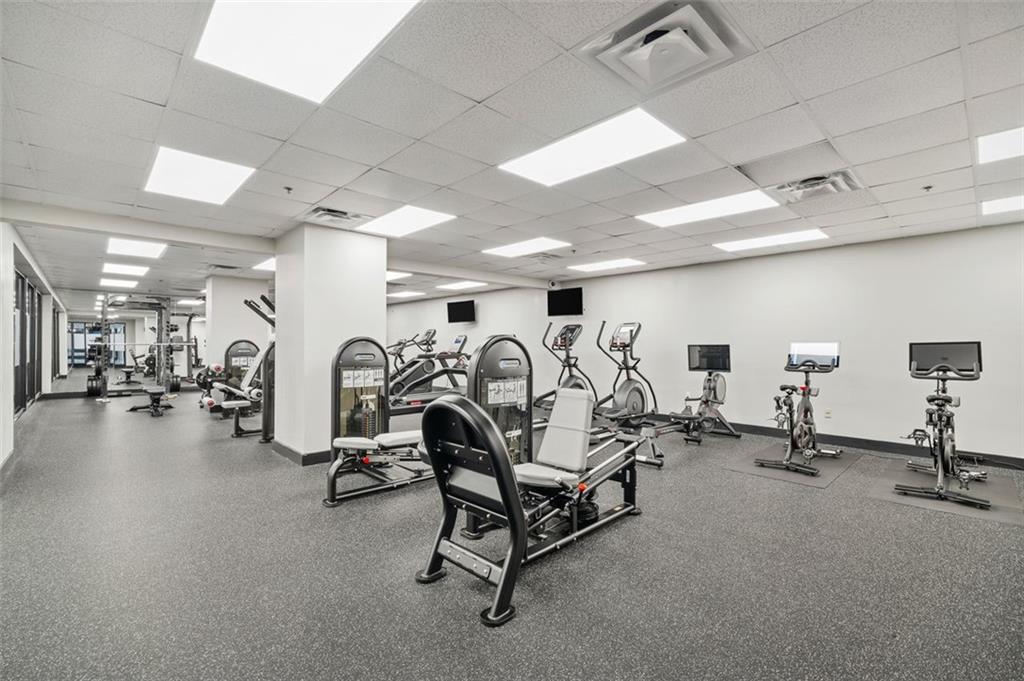 620 Peachtree Street Northeast, Unit 1716 Atlanta, GA 30308 - Photo 26 of 37 a view of a room with gym equipment