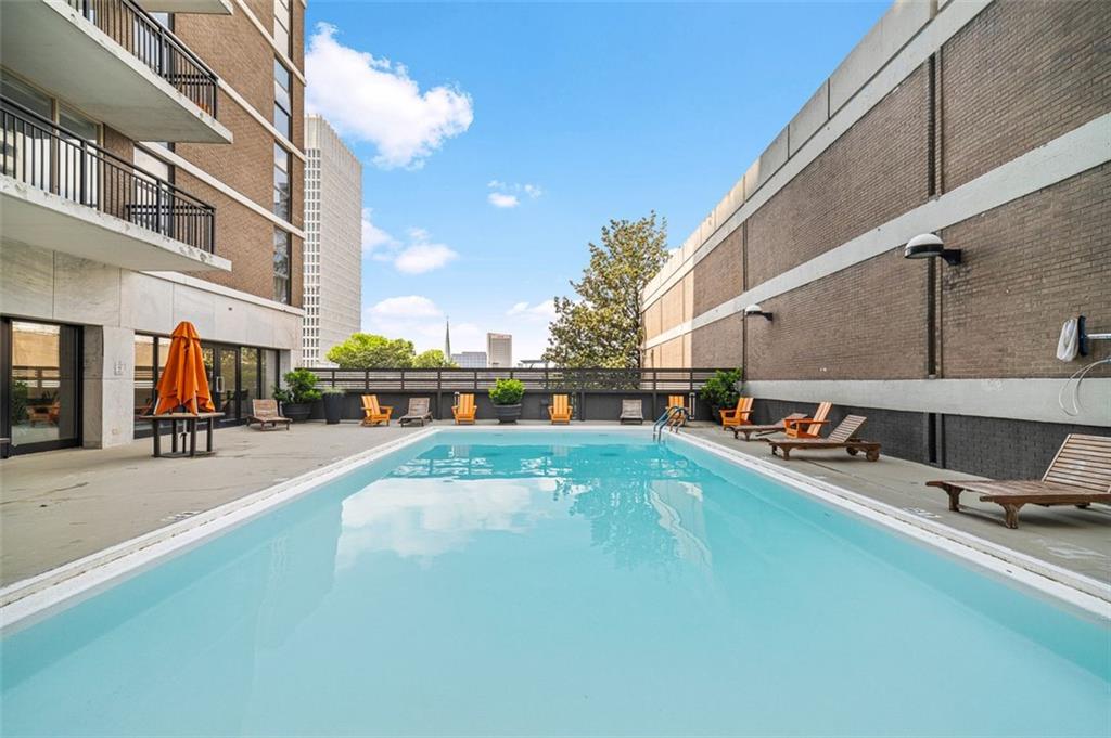 620 Peachtree Street Northeast, Unit 1716 Atlanta, GA 30308 - Photo 28 of 37 a view of a swimming pool with sitting area