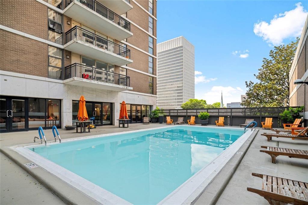 620 Peachtree Street Northeast, Unit 1716 Atlanta, GA 30308 - Photo 29 of 37 a view of a swimming pool with a patio