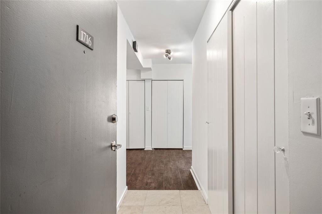 620 Peachtree Street Northeast, Unit 1716 Atlanta, GA 30308 - Photo 3 of 37 a bathroom with a shower and a mirror