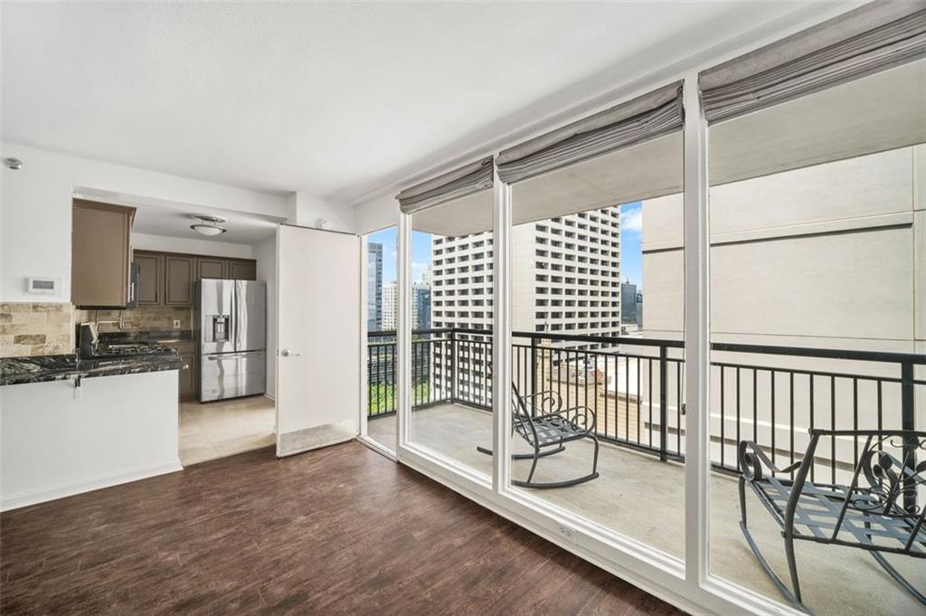 620 Peachtree Street Northeast, Unit 1716 Atlanta, GA 30308 - Photo 7 of 37 a view of a bathroom with a glass door