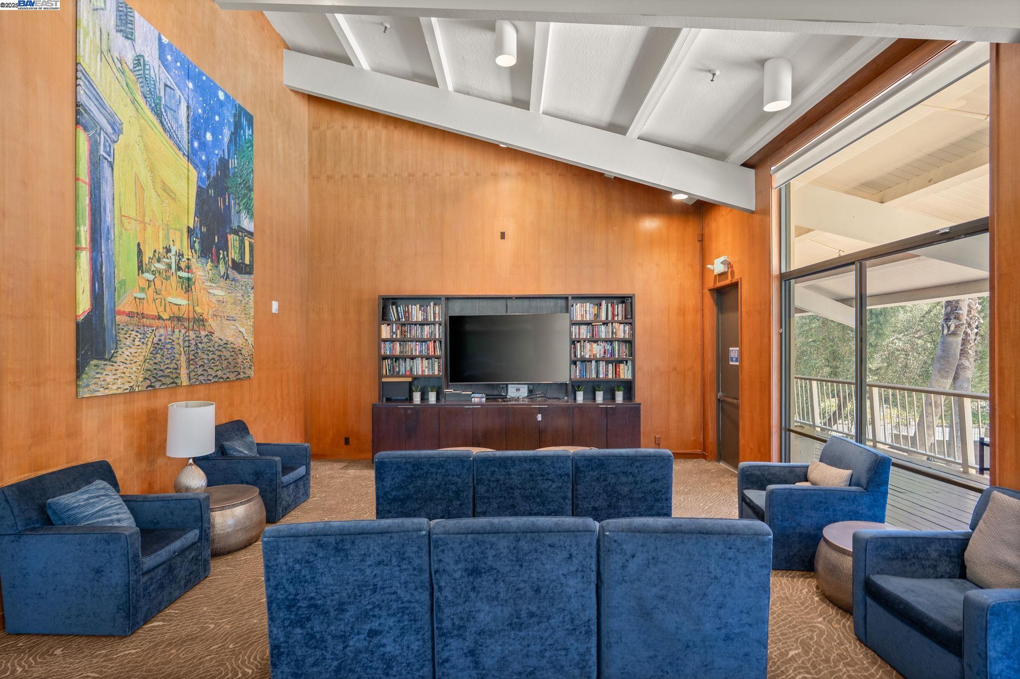 300 North Civic Drive, Unit 403 Walnut Creek, CA 94596 - Photo 14 of 19 a living room with furniture and a flat screen tv