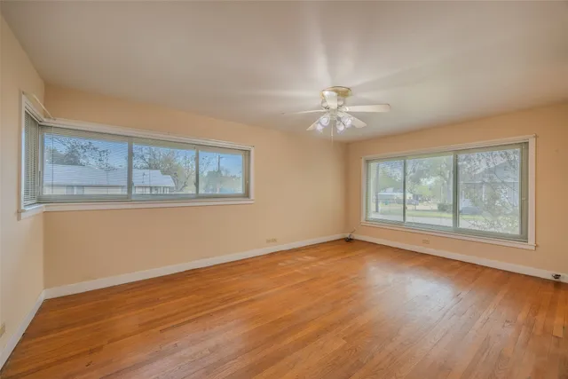 a view of a swimming pool with a yard