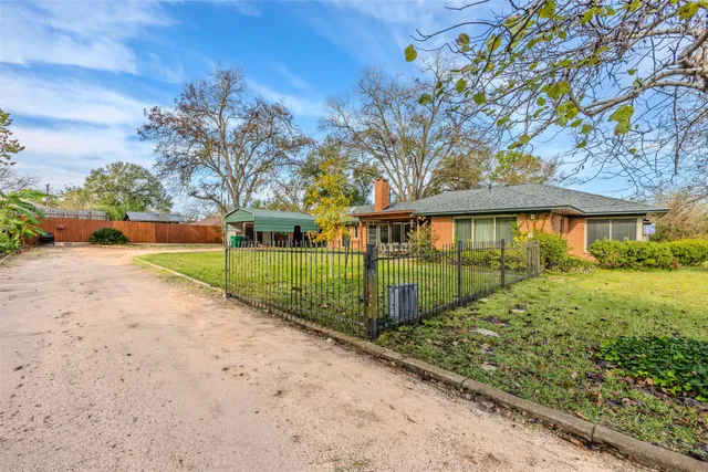 a view of a pathway with a street