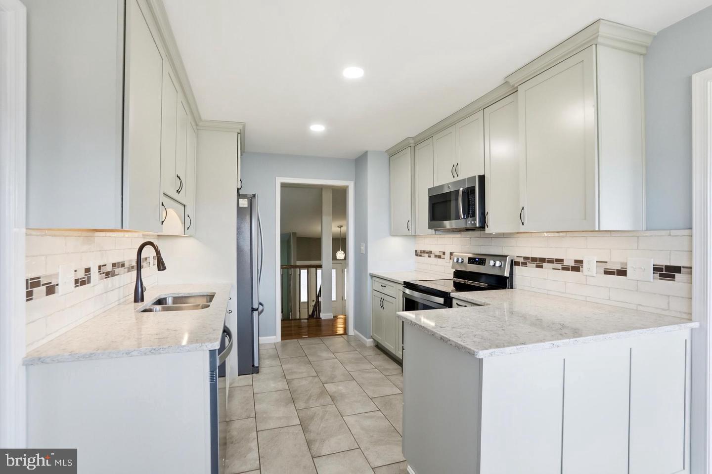 4708 Summit Road Charles Town, WV 25414 - Photo 11 of 33 Modern kitchen with sleek finishes.