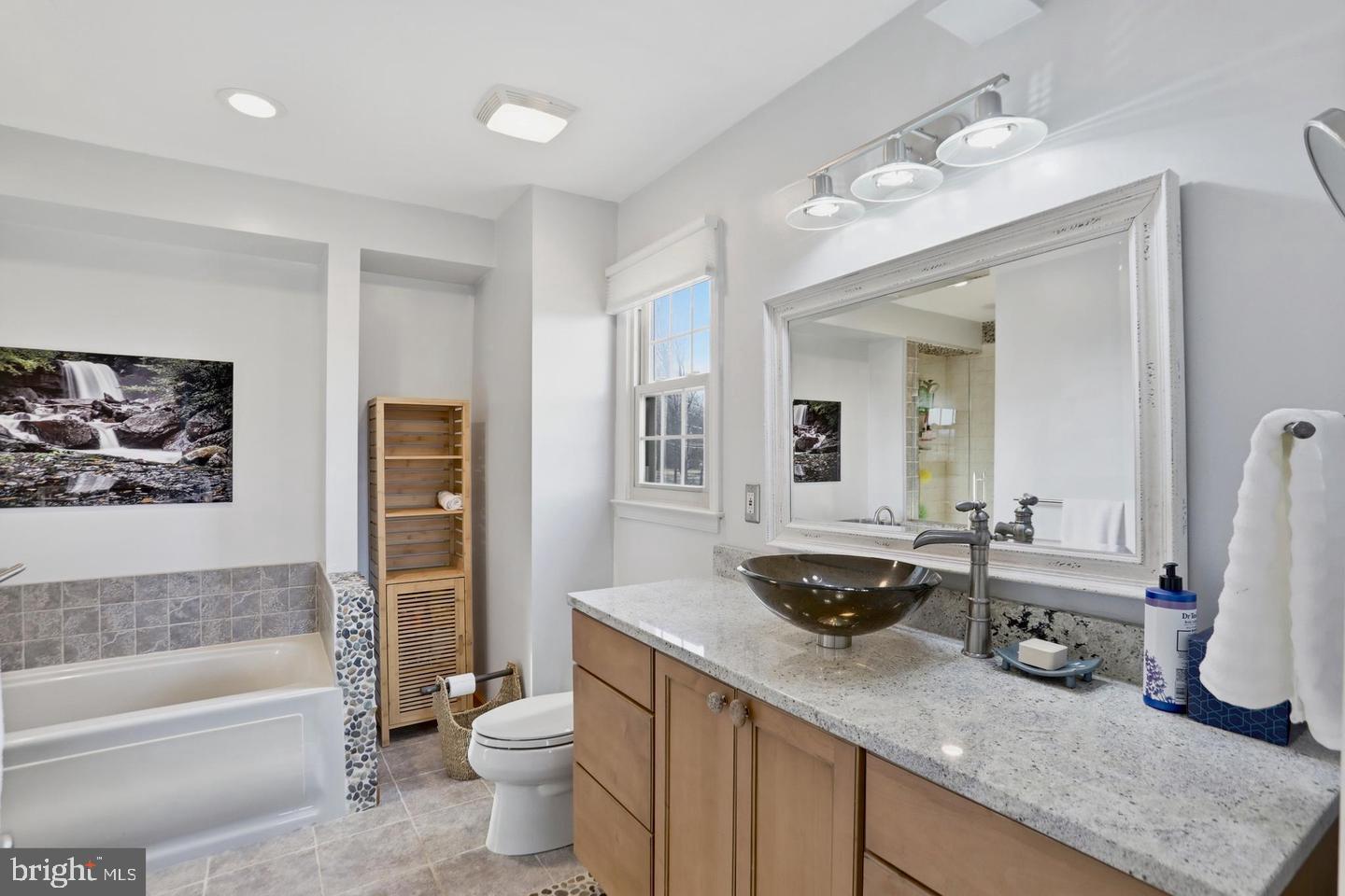 4708 Summit Road Charles Town, WV 25414 - Photo 17 of 33 Modern bathroom with serene accents.