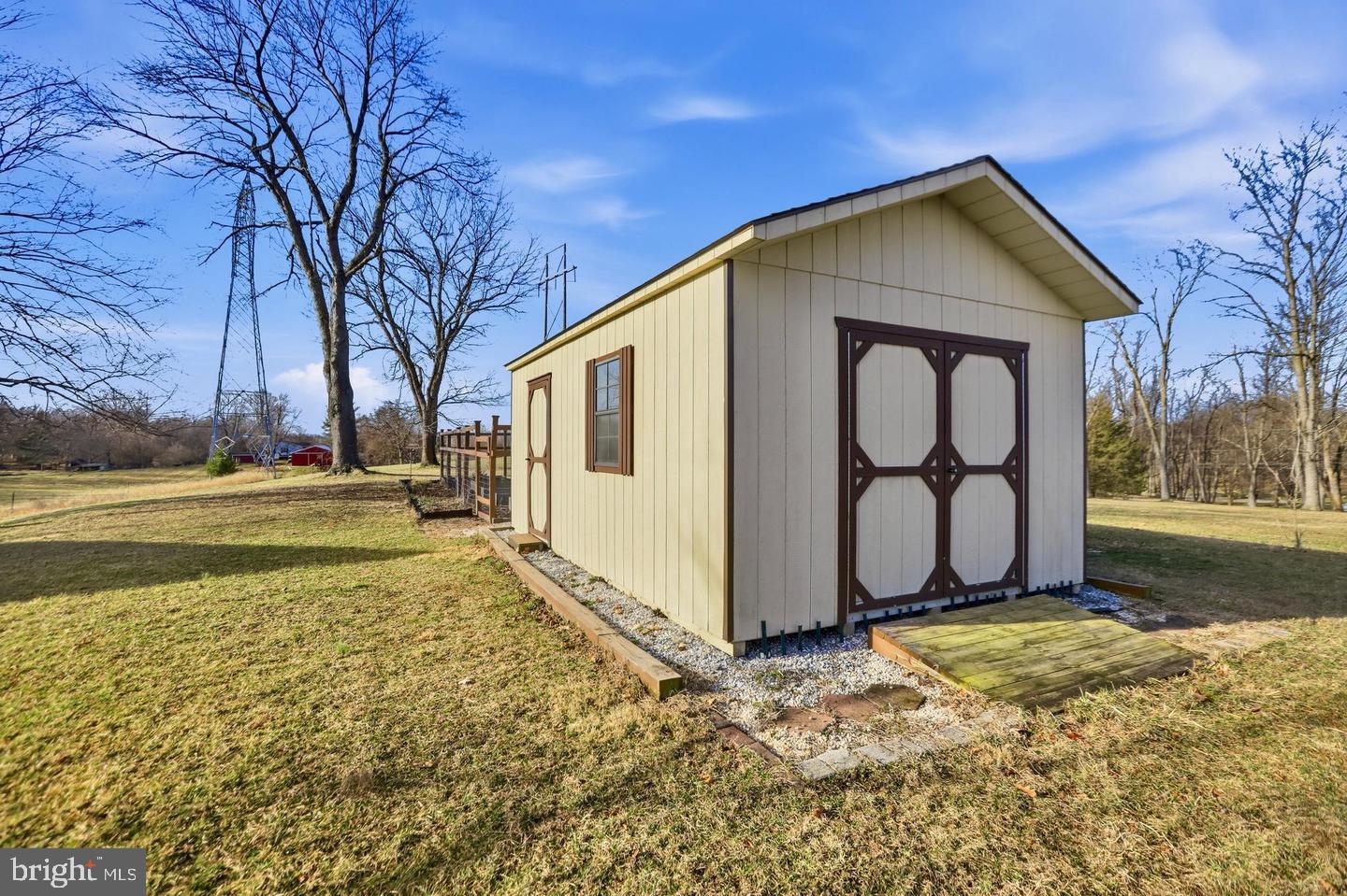 4708 Summit Road Charles Town, WV 25414 - Photo 31 of 33 Charming shed in a serene landscape.