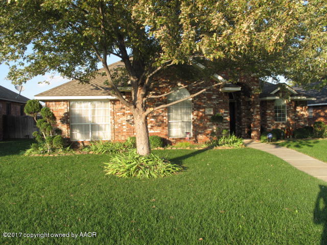 6606 Rally Road Amarillo, TX 79119 - Photo 3 of 20 a front view of a house with a yard
