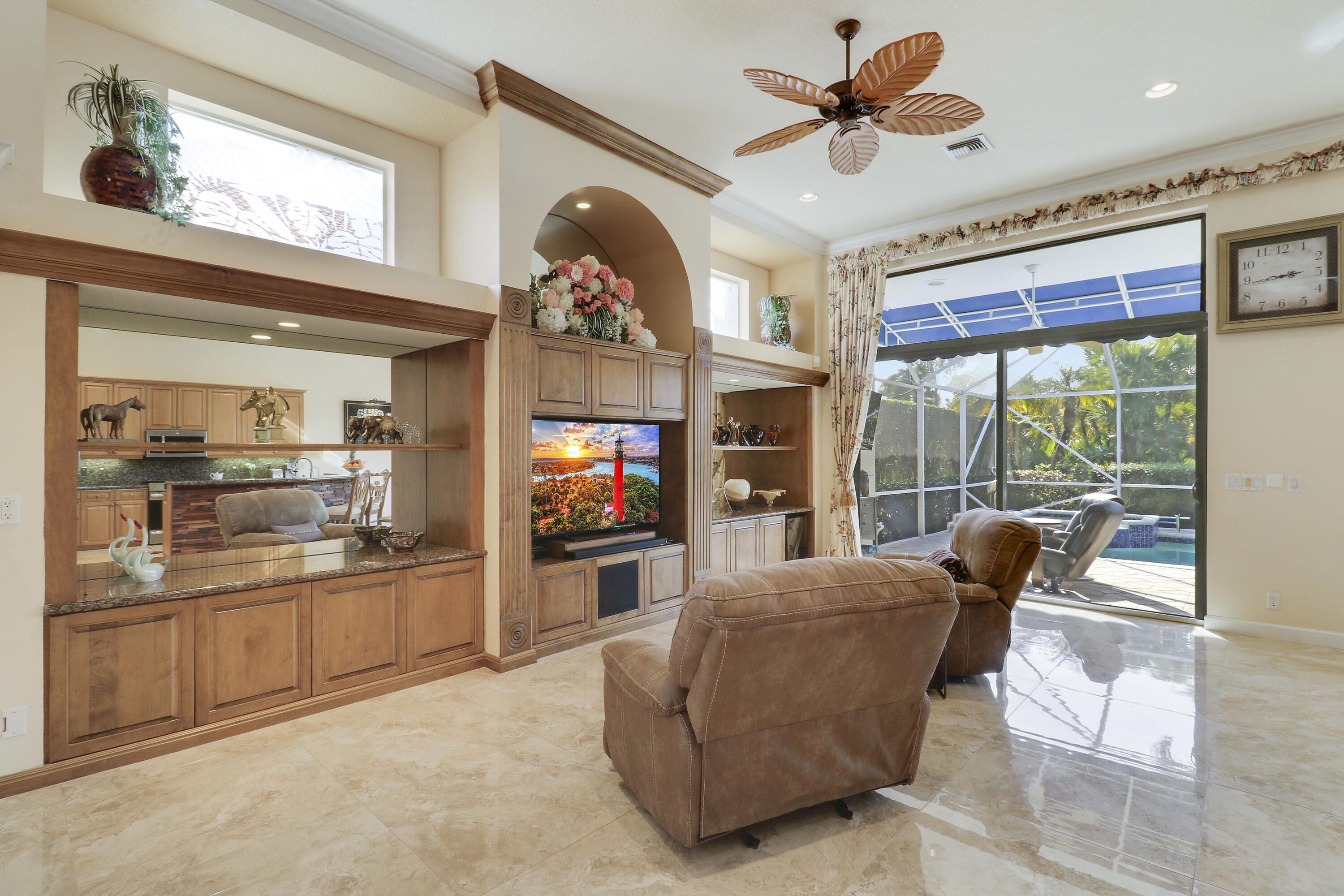 8216 Cypress Point Road West Palm Beach, FL 33412 - Photo 24 of 62 a living room with furniture and a flat screen tv