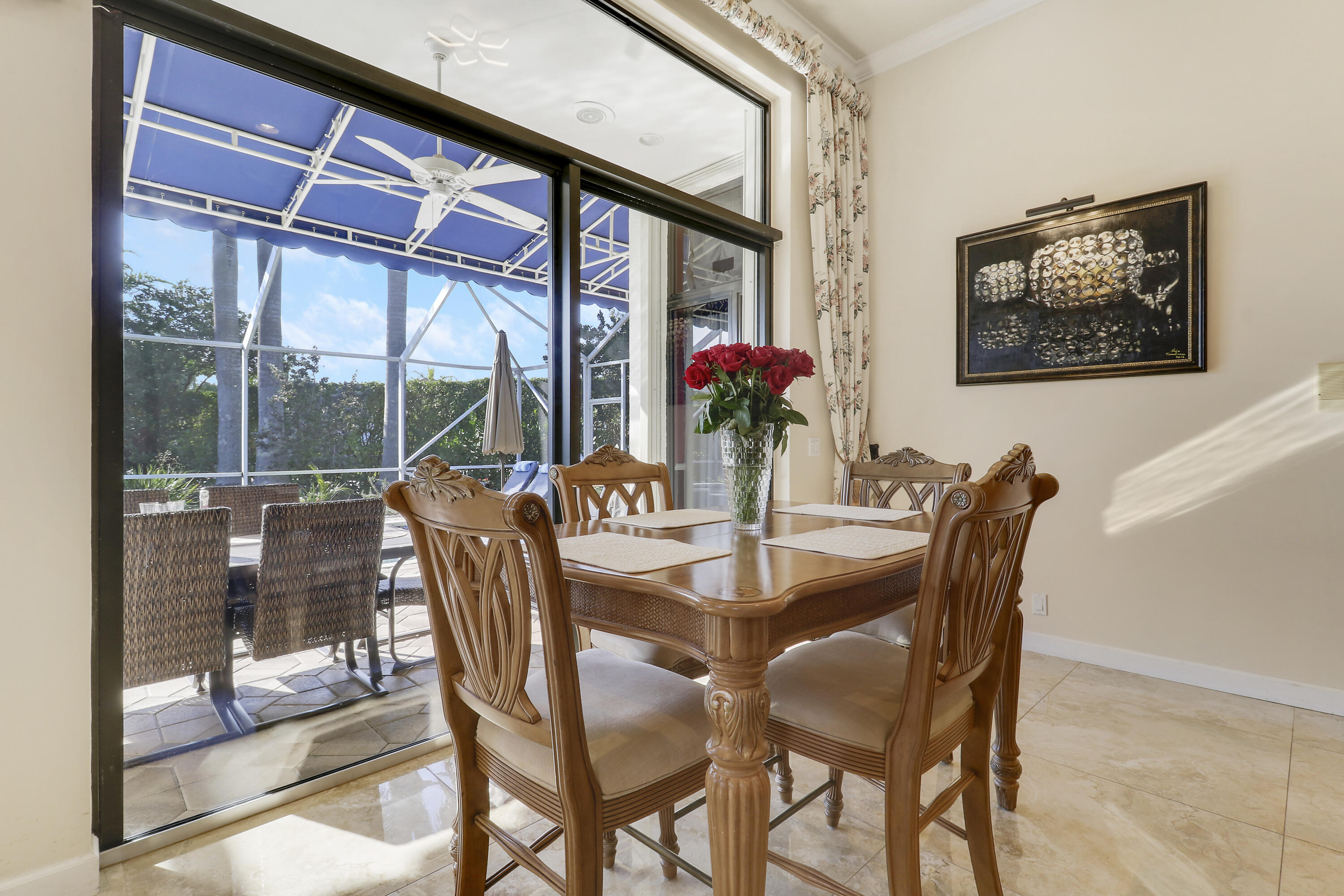 8216 Cypress Point Road West Palm Beach, FL 33412 - Photo 33 of 62 a dining room with furniture and window