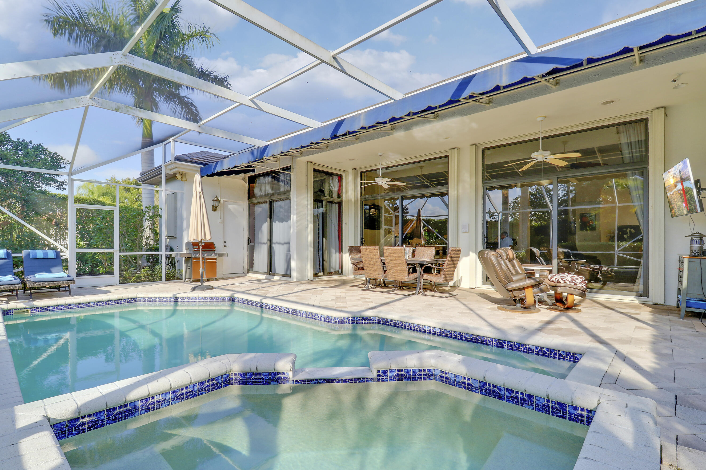 8216 Cypress Point Road West Palm Beach, FL 33412 - Photo 37 of 62 a view of a backyard with swimming pool