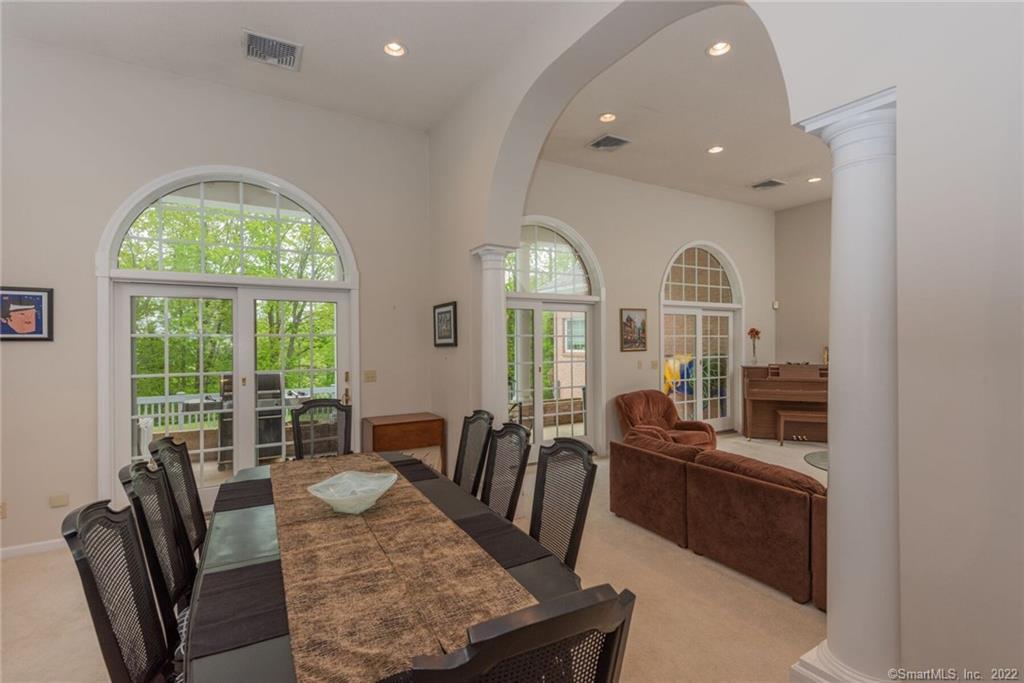 54 Bulkeley Hill Road Colchester, CT 06415 - Photo 18 of 40 a view of a a dining room with furniture window and outside view