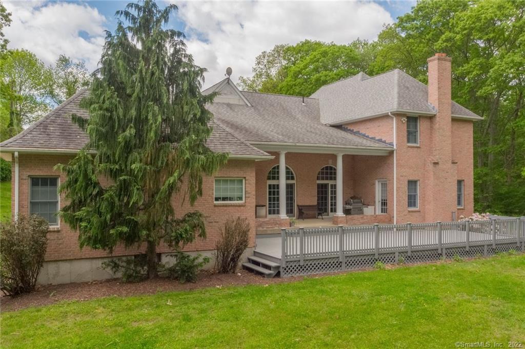 54 Bulkeley Hill Road Colchester, CT 06415 - Photo 36 of 40 front view of a house with a yard