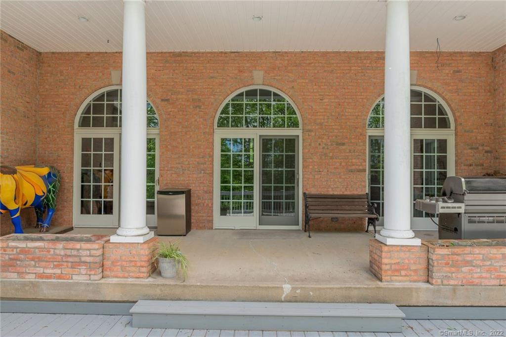 54 Bulkeley Hill Road Colchester, CT 06415 - Photo 37 of 40 a view of front door and potted plants