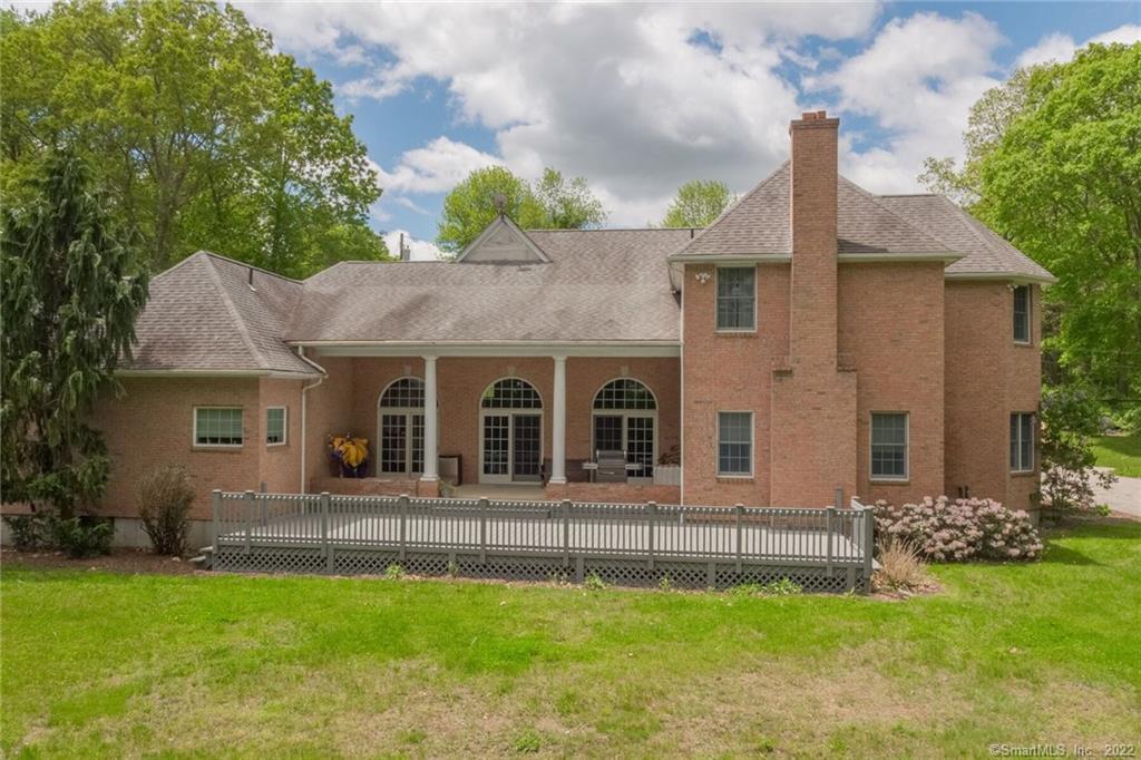54 Bulkeley Hill Road Colchester, CT 06415 - Photo 7 of 40 a front view of a house with a garden