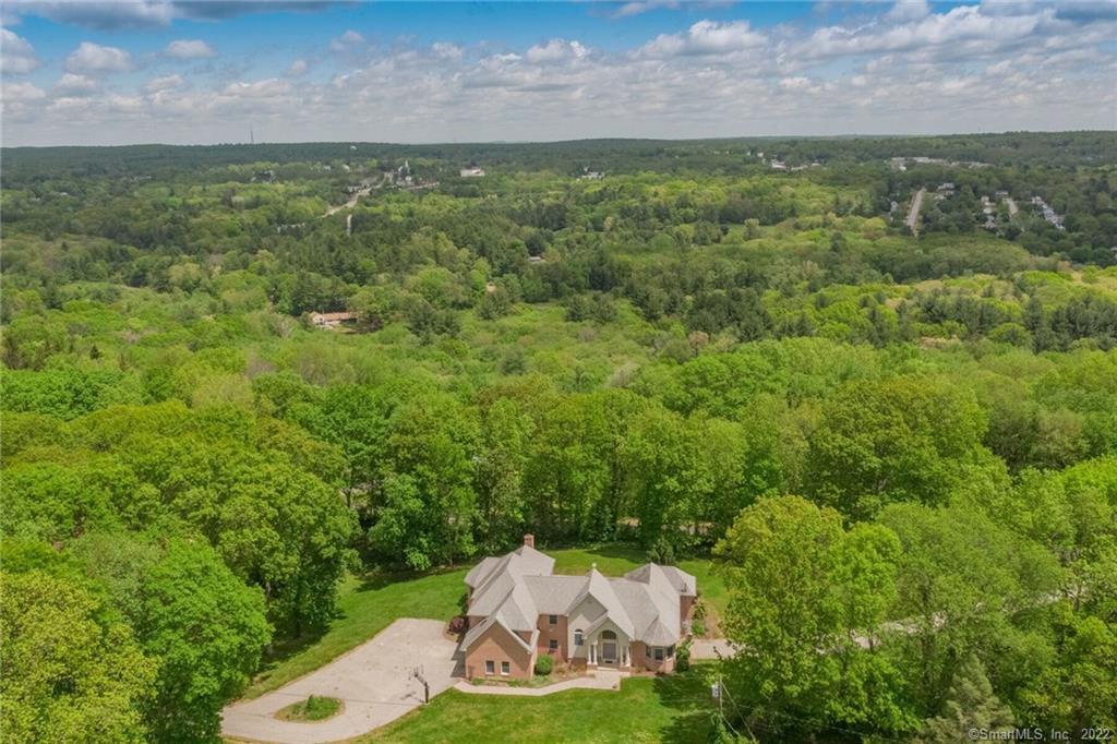 54 Bulkeley Hill Road Colchester, CT 06415 - Photo 9 of 40 an aerial view of a house with a yard