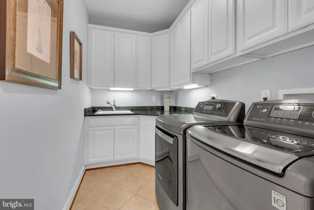 a view of staircase with lots of wooden floor and windows
