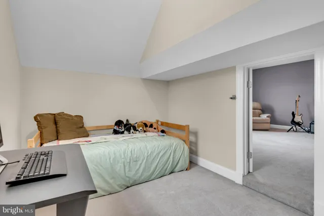 a view of a room with wooden walls