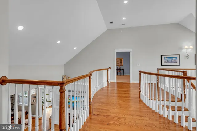 a view of a field with trees in front of it