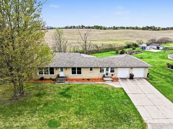 $299,900 | 1040 6 Mile Road Northwest, Comstock Park, MI 49321