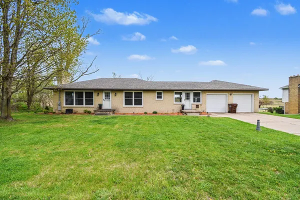 $299,900 | 1040 6 Mile Road Northwest, Comstock Park, MI 49321