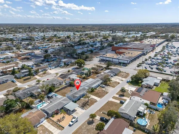 an aerial view of a city with lots of residential buildings