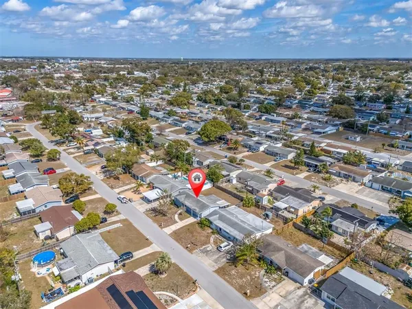 an aerial view of a city with lots of residential buildings