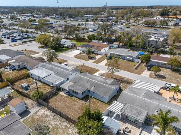 a view of a house with a yard and garage