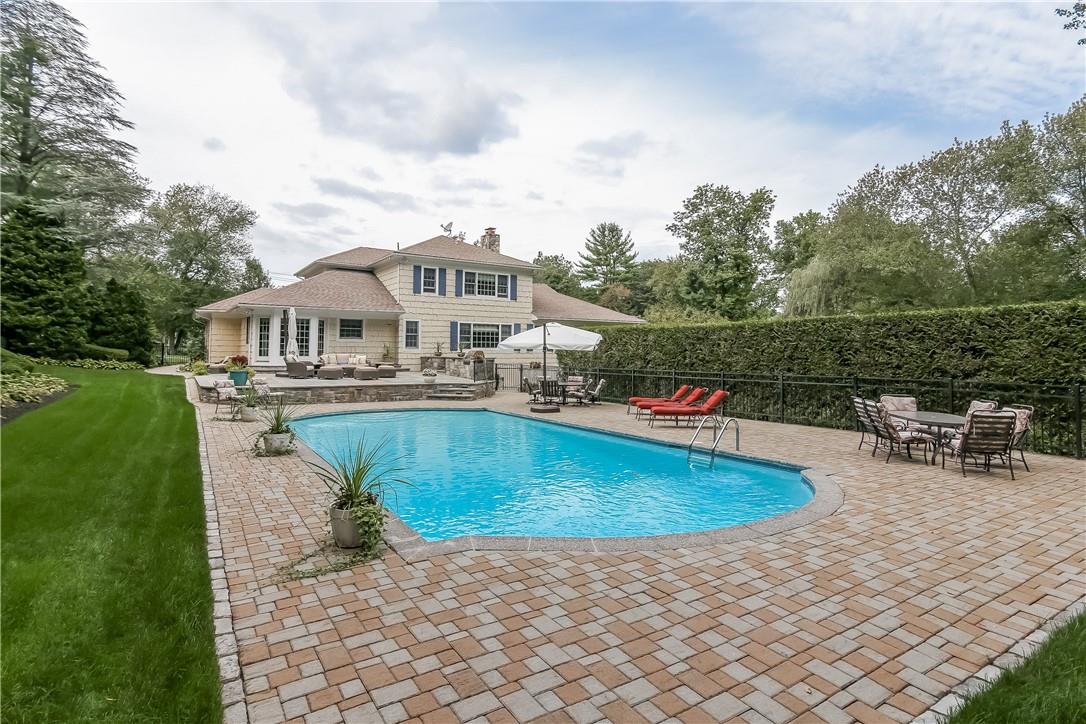 5 Sunset Lane Harrison, NY 10528 - Photo 1 of 1 Welcome to 5 Sunset Lane...relax and go for a swim!