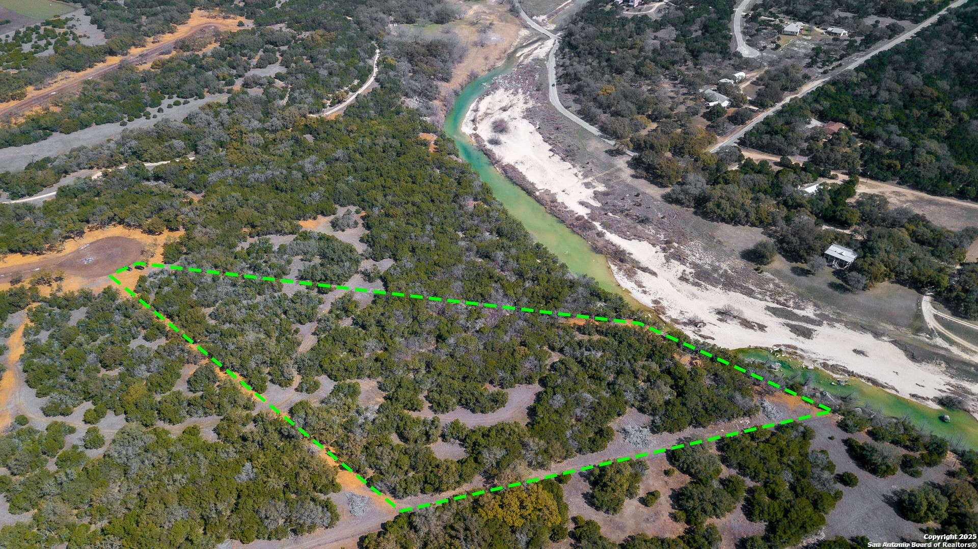 1246 Clearwater Canyon Road Bandera, TX 78003 - Photo 15 of 27 a view of a garden with plants