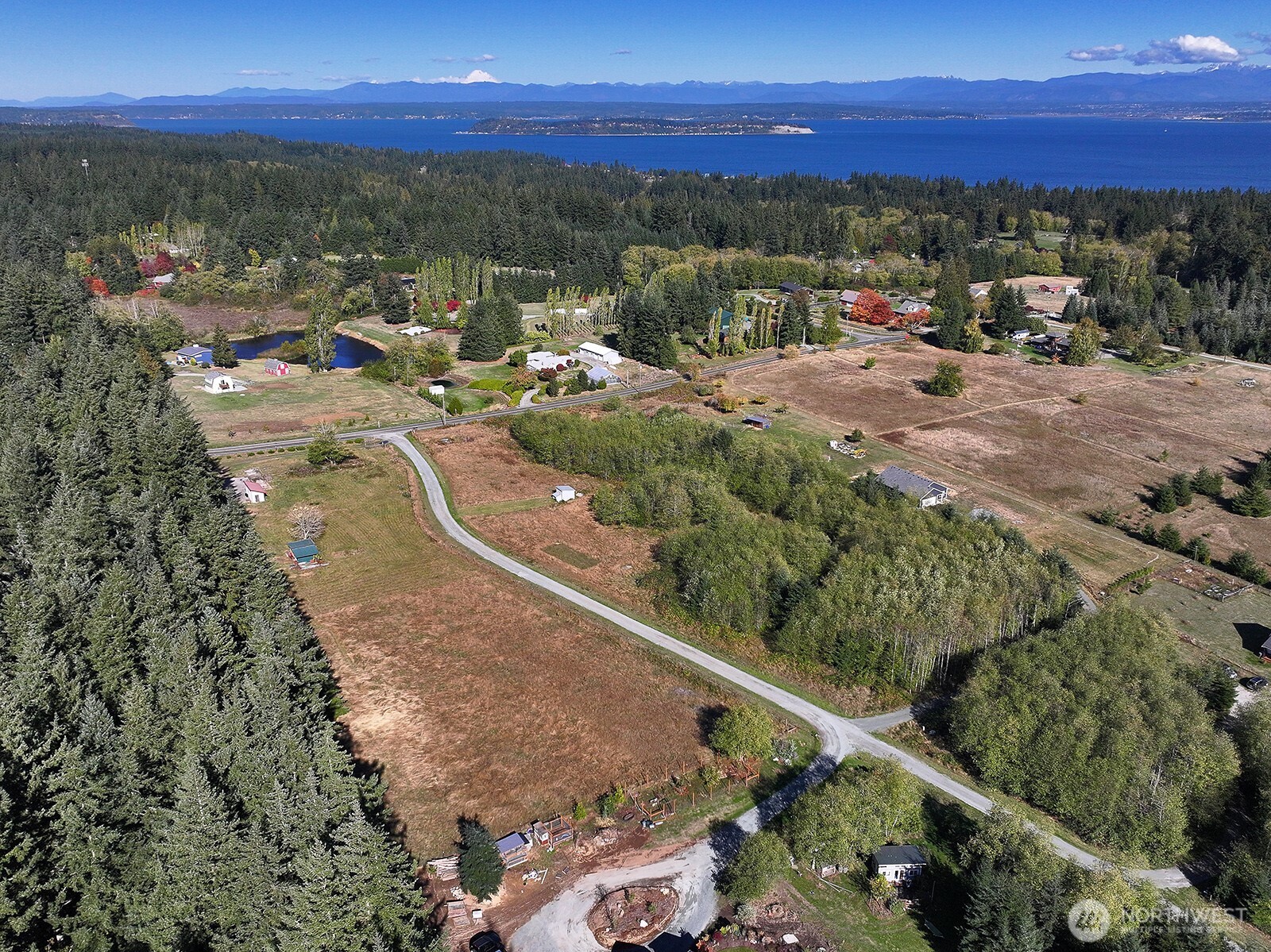 7110 Olin Place Clinton, WA 98236 - Photo 6 of 12 a view of a city with ocean view