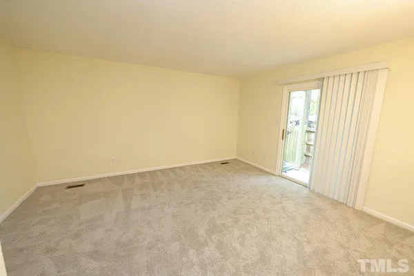 an empty room with a natural light