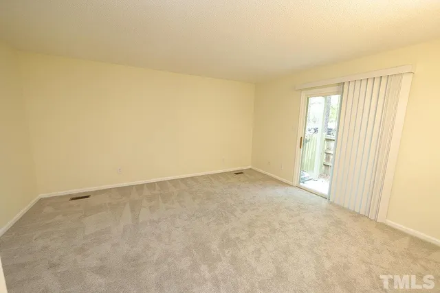 an empty room with a natural light