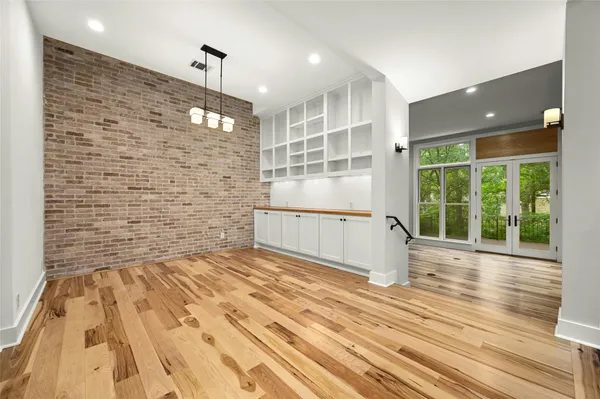 a kitchen with a sink stove and refrigerator