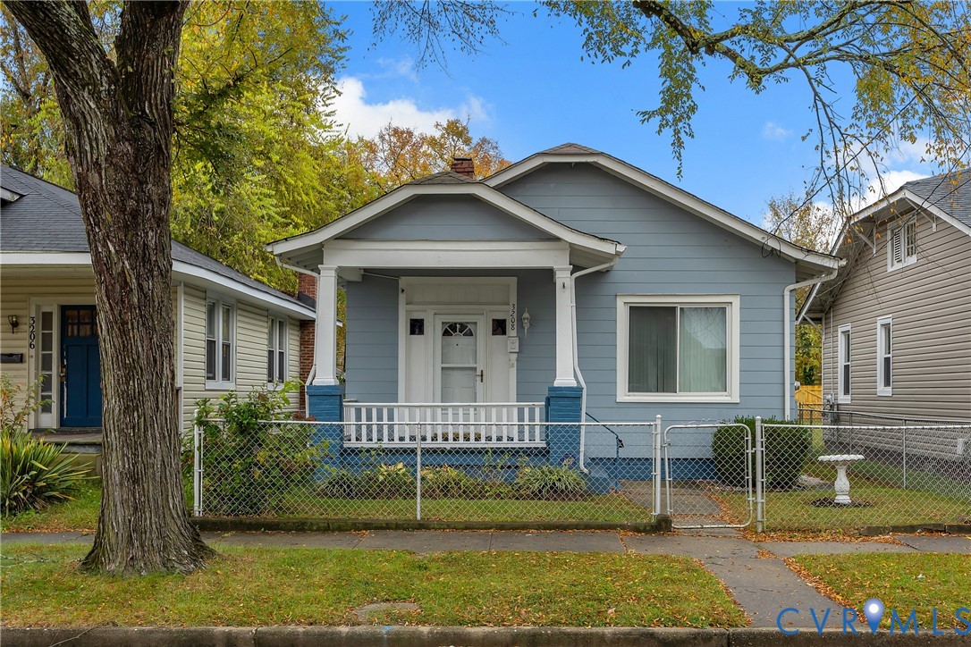 3208 Decatur Street Richmond, VA 23224 - Photo 1 of 12 View of front of house with a gate, covered porch,