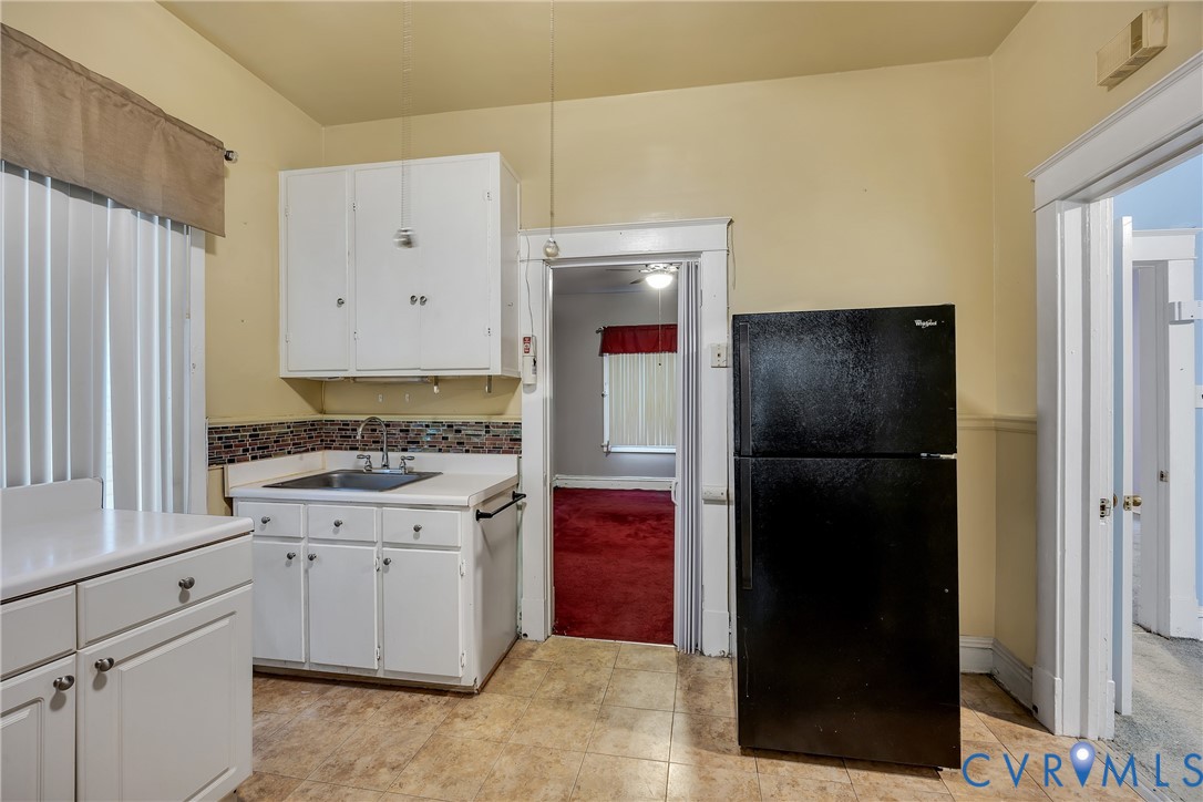 3208 Decatur Street Richmond, VA 23224 - Photo 8 of 12 Kitchen featuring freestanding refrigerator, light