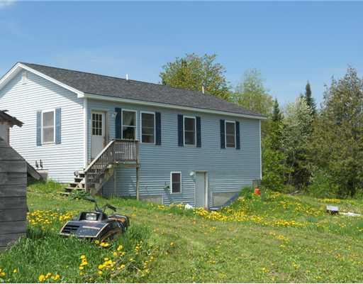 624 Grant Road Corinth, ME 04427 - Photo 2 of 15 Exterior Back.