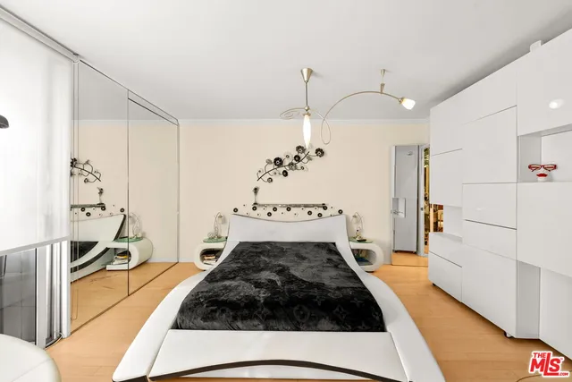 a view of a kitchen with a stove and a refrigerator