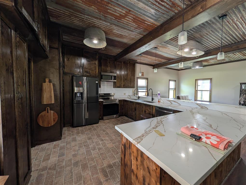 11480 Blanchard Road Welsh, LA 70591 - Photo 35 of 48 Stainless appliances and 2 utility sinks