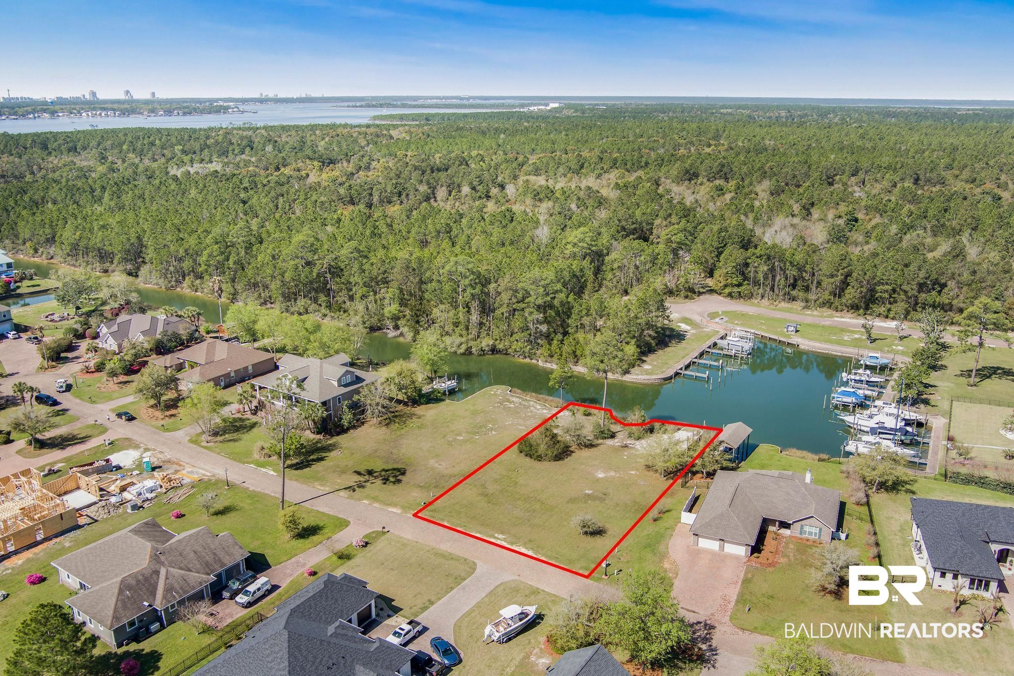 6433 East Quarry Drive Elberta, AL 36530 - Photo 6 of 10 Birds eye view of property featuring a wooded view and a water view