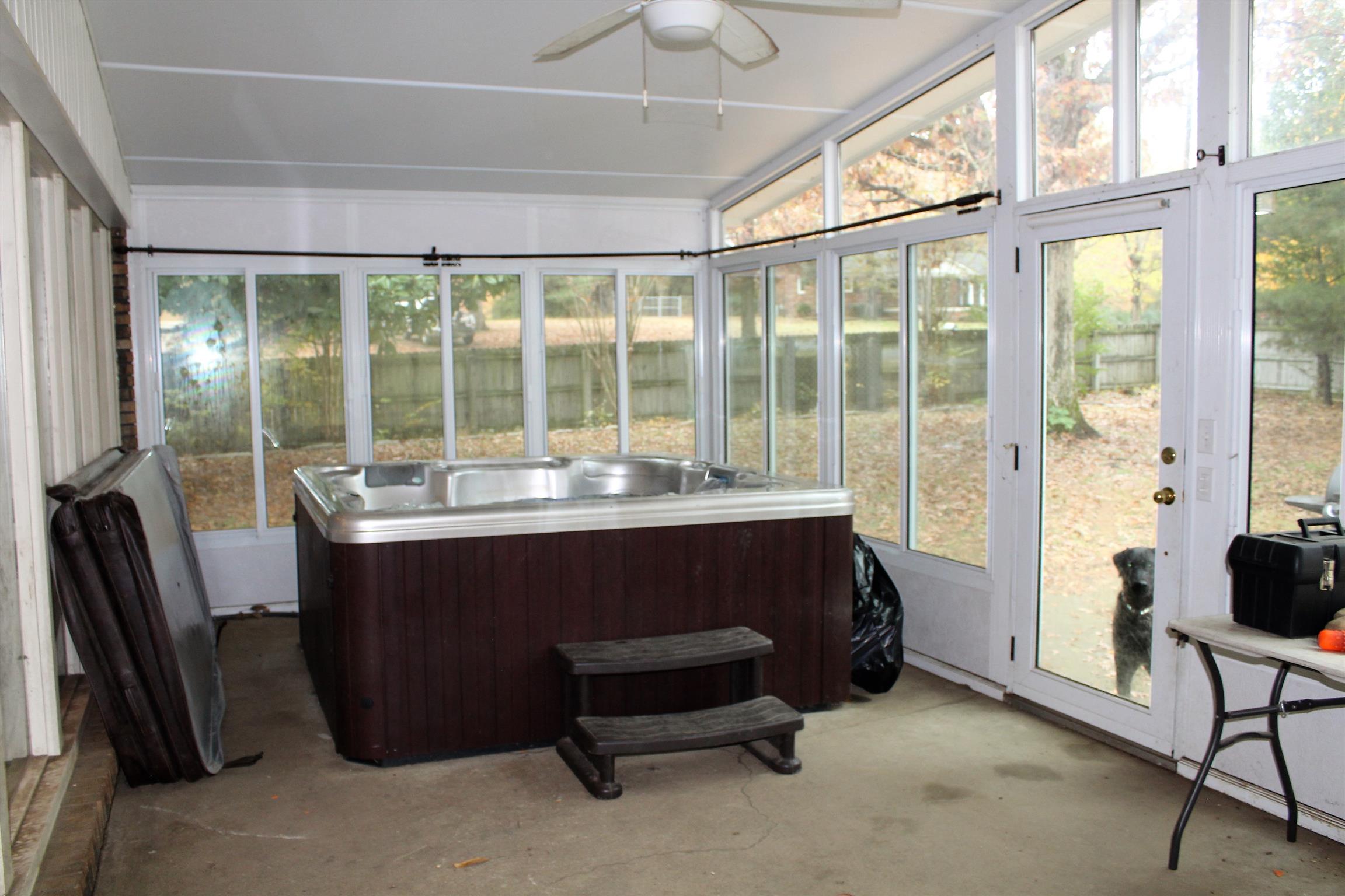 462 Furnace Hollow Road Dickson, TN 37055 - Photo 16 of 24 sunroom with hot tub that stays