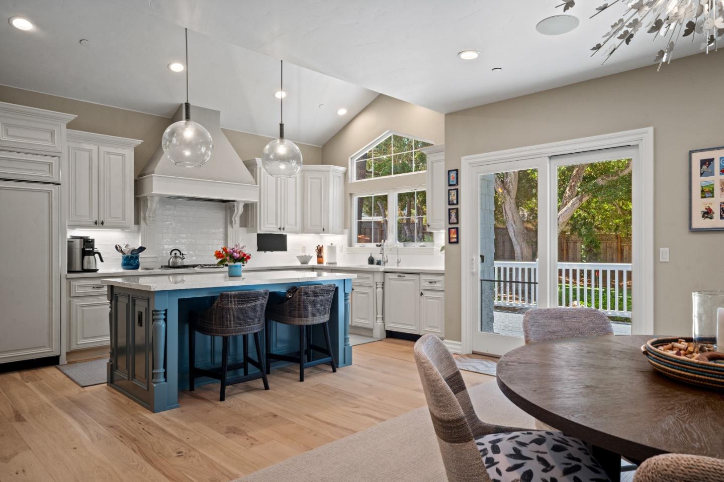 2823 Congress Road Pebble Beach, CA 93953 - Photo 11 of 49 a kitchen with stainless steel appliances granite countertop a sink a stove and a refrigerator