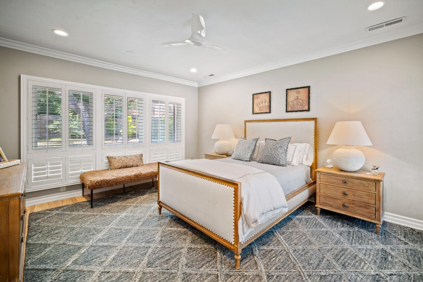 2823 Congress Road Pebble Beach, CA 93953 - Photo 19 of 49 a spacious bedroom with a bed and glass window