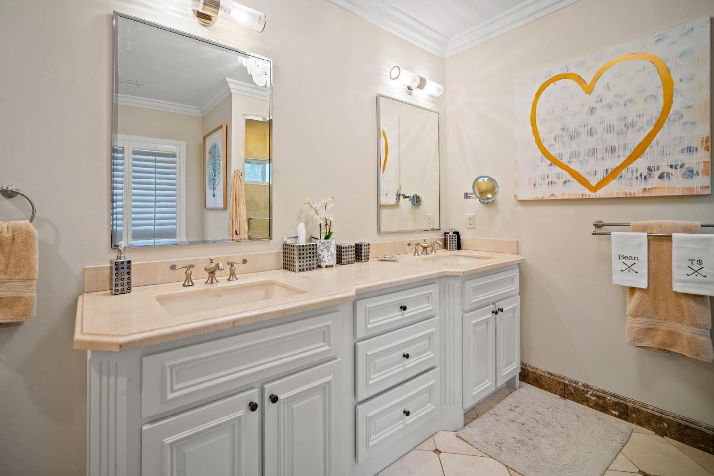 2823 Congress Road Pebble Beach, CA 93953 - Photo 22 of 49 a bathroom with a sink and a mirror