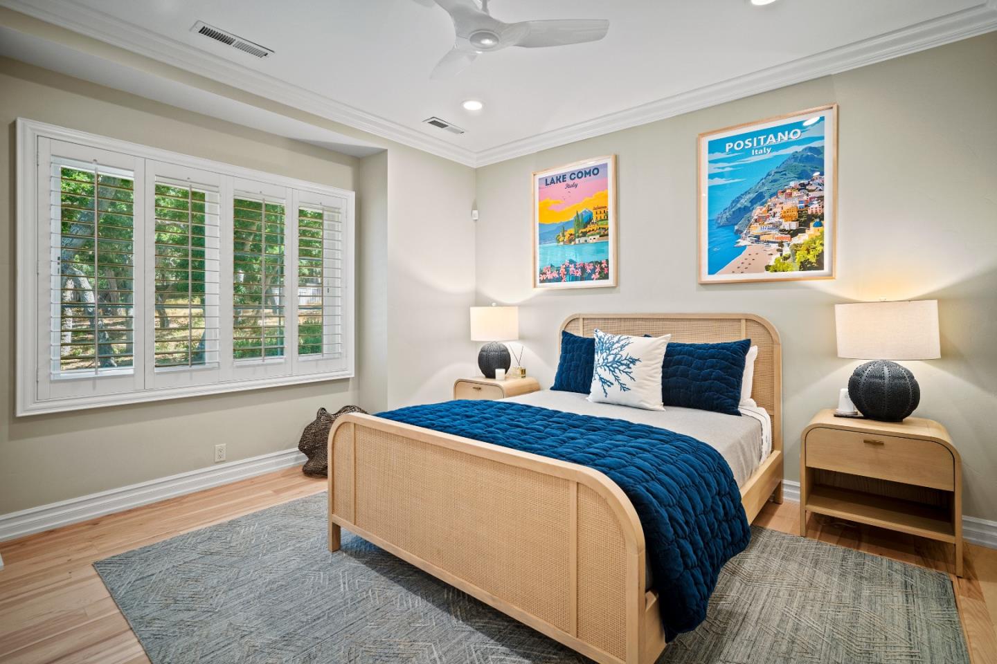 2823 Congress Road Pebble Beach, CA 93953 - Photo 23 of 49 a bedroom with a bed and wooden floor