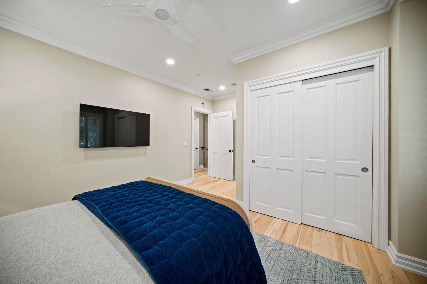 2823 Congress Road Pebble Beach, CA 93953 - Photo 24 of 49 a bedroom with a bed and a flat screen tv