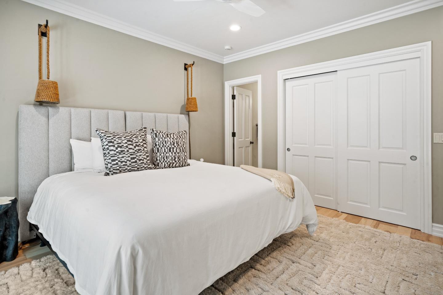 2823 Congress Road Pebble Beach, CA 93953 - Photo 27 of 49 a bedroom with a bed and a window