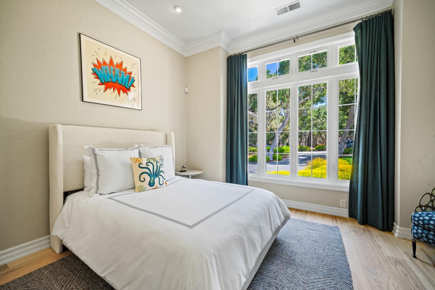 2823 Congress Road Pebble Beach, CA 93953 - Photo 30 of 49 a bed sitting in a bedroom next to a window