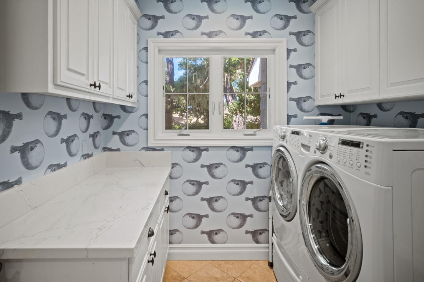 2823 Congress Road Pebble Beach, CA 93953 - Photo 33 of 49 a view of a kitchen with washer and dryer